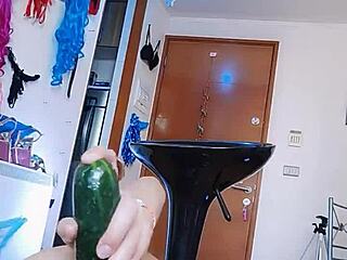 Amateur Asian takes on big cucumber in satin silk scarves anal