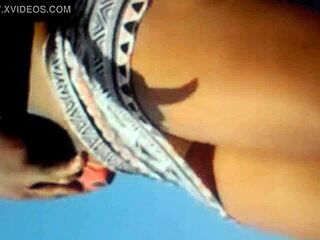 Ebony panties and camel-themed toe play in upskirt video