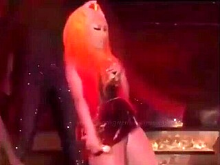 Celebrity Nicki Minaj shows off her tits in flashing video