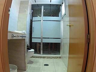 Madama satisfies herself with a shower and her big ass