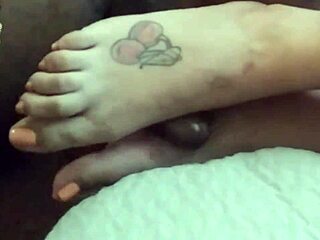 Interracial footjob with a BBW and big black cock