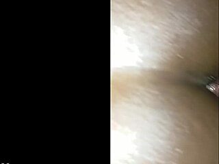 Dark-skinned woman's wet vagina receives a white penis up close in part one