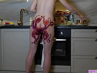 Inked housewife cooks up a storm in the kitchen